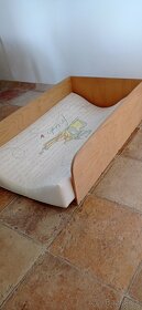 Ohrádka proti spadnutí z přebalovací podložky