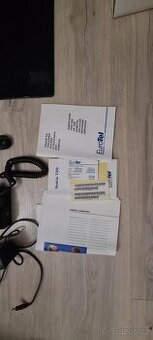 Přenosný mobil Nokia 720 s návodem krabici