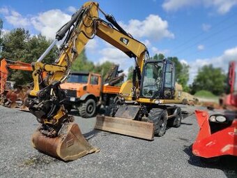 Kolový otočný bagr CAT 313D