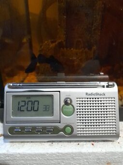 Prodám malý přenosný radio a budik s výklopný displej -