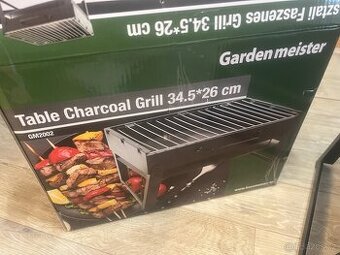 Prodám nový stolní gril na dřevěné uhlí