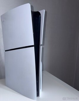PS5 1TB + 2 ovladače + nabíjecí dok + hry