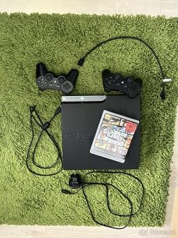 PS3 herní konzole + 2 ovladače + hra GTA V