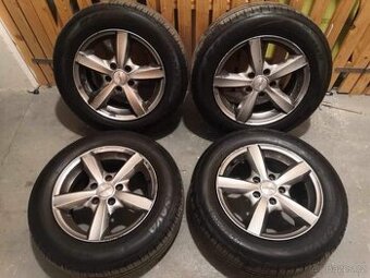 Letní pneu s hliniky na Opel