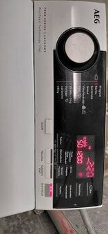 Aeg prač̣ka 7kg vrch.parní.typ vyfocený.