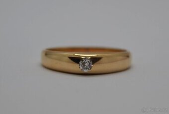 Zlatý prsten s briliantem  0.16 ct