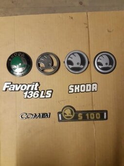 Znaky ,zrcátka .,štítky Škoda atd .