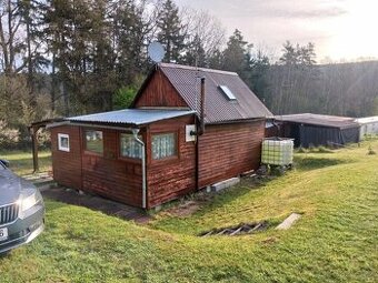 Chata u řeky Vltavy