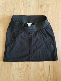 Těhotenská minisukně