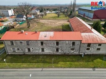 Prodej rodinného domu s pozemky o celkové výměře 4945 m2 v o