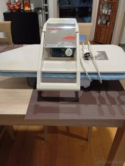 Elektrický mandl ruční.