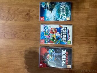 Nintendo switch lite + 3 hry