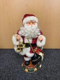 Dekorativní vánoční Santa Claus hraje/tančí