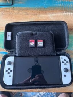 Nintendo Switch OLED + 2 hry