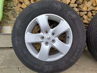 Suzuki Grand Vitara originální ALU kola 16" letní pneu