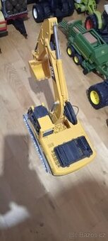 Pásový bagr Caterpillar Brudr - 1