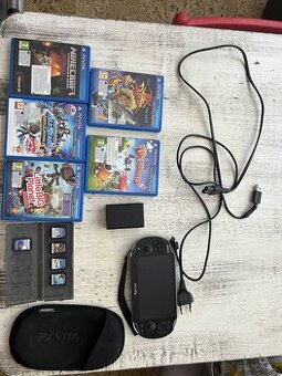 PS Vita OLED + hry a příslušenství