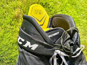 Hokejové juniorské kalhoty CCM Tacks 9060 vel.JR S