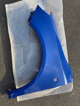 Škoda Fabia 2 levý přední blatník