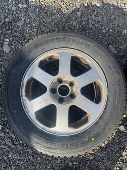 Alu octavia 1 5x100 s celoročními pneu 195/65/r15