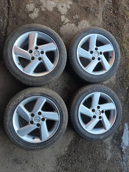 Prodám sadu Alu disků Mazda 7Jx16H2 ET55 + pneu 205/55/16