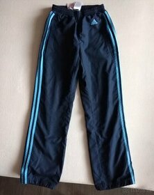 Šusťákové tepláky zn. Adidas
