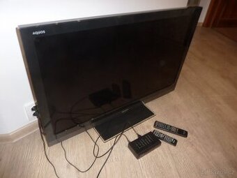 TV SHARP LC-40LE705E + set top box EVOLVE OMEGA T2