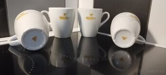 Bílé keramické hrníčky s logem Tchibo