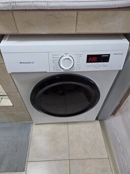 Úzká předem plněná pračka Philco PLDS127DG v záruce