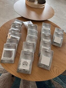 Vypínače, rámečky a zásuvky