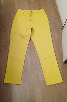 Žluté, koženkové kalhoty