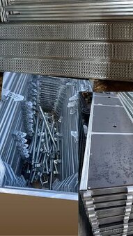 Prodám kvalitní lešení _typ BAUMANN komponenty na 108m2,