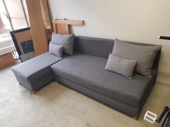 Malý rozkládací gauč s úložným prostorem