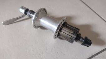 Zadní náboj Shimano Altus 7 SIS