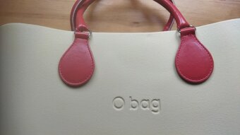 Prodám krásný nový Obag v krémovo béžová barvě s hnědými uch