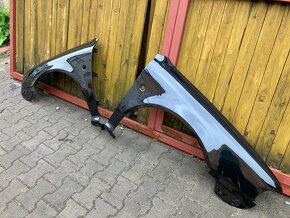 levy i pravy přední blatník Škoda Octavia 1,I,barva 9910