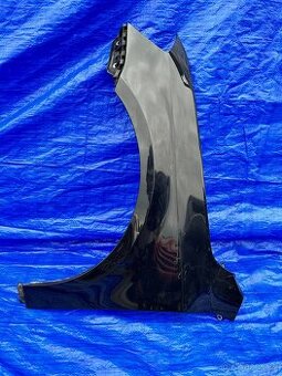 Levý přední blatník Passat B7