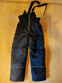 Lyžařské kalhoty s laclem černé vel. 140-146