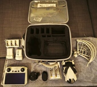 DJI MINI 3,  přepravní kufr a další příslušenství.