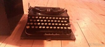 Psací stroj kufříkový Remington