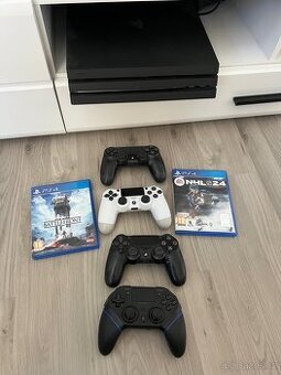 PlayStation 4 pro 1TB (PS4) + 4 ovladače a 2 hry