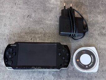 - PSP Sony konzole+ hra Gran Turismo -
