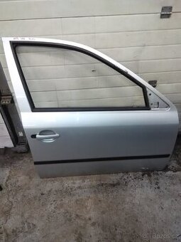 Škoda octavia 1 pravé přední dveře stříbrná metalíza 9102