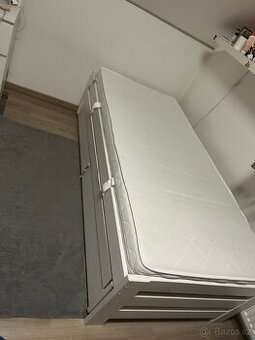 Drevena rozkladaci postel z borovice