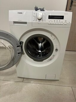 Automatická pračka AEG, mini myčka HYUNDAI