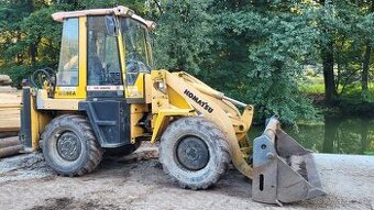 Traktorbagr Komatsu kloubový 4.236