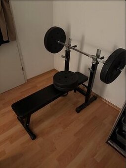 Lavice a dvourucni cinka na posilovani Bench press