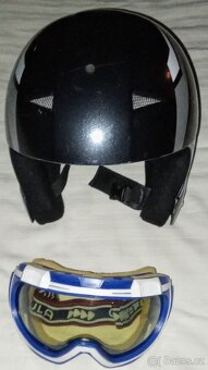 Přilba Action Evo , velikost M a brýle značky Okula