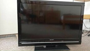 Starší LCD televizor se set-top-boxem - 1