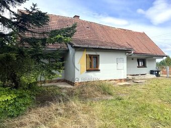 Prodej rodinného domu se zahradou a stavebním pozemkem v obc
